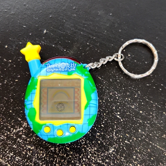 Rare Vintage Tamagotchi Connection 2004 Bandai World Globe Shell - Picture 1 of 4